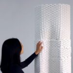 Turning Waste Into Walls with Additive Manufacturing