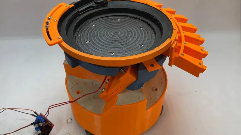Engineer 3D Prints Vibratory Feeder
